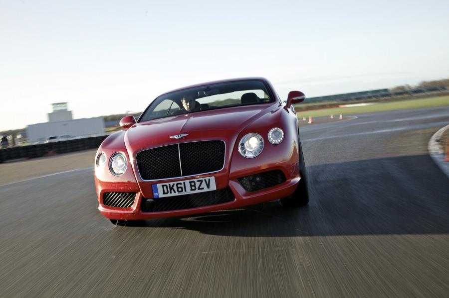  Bentley Continental GT V8 2011 года  (фото 28 из 39)